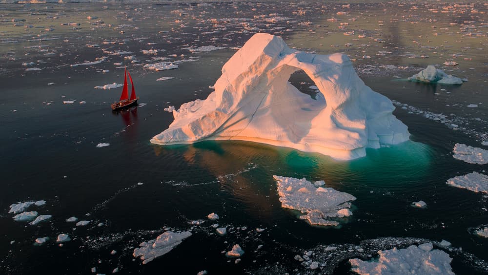 Iceberg Arch Sunset Sail by Marc Pelissier — canvas wall art