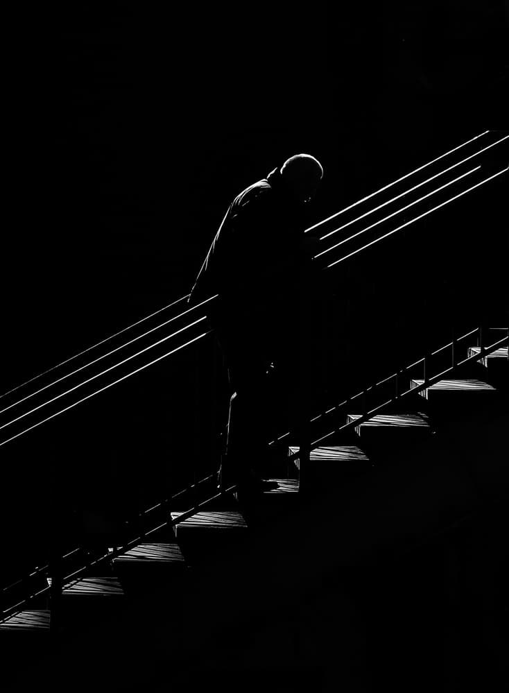 Man on Dark Stairs by Anna Niemiec — canvas wall art