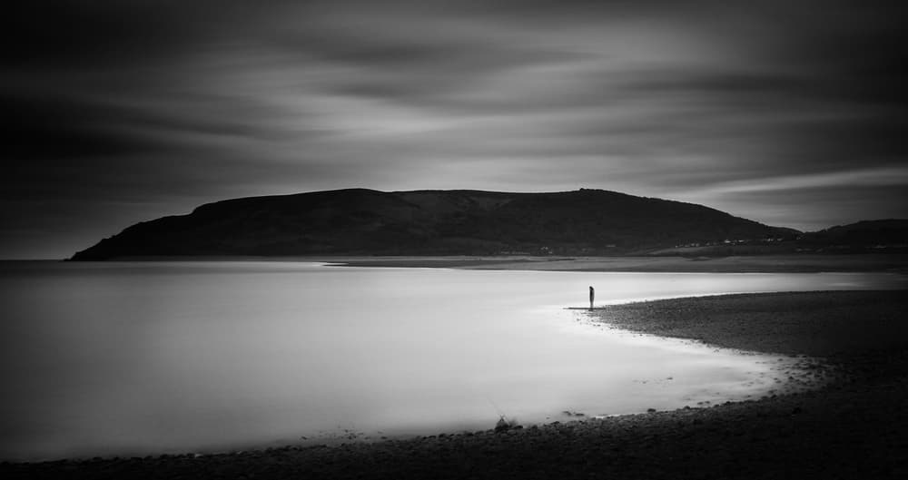 Solitary Figure Dark Waters by Catalin Alexandru — canvas wall art