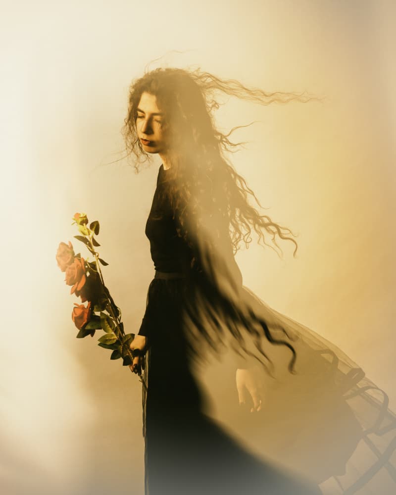 Pensive Woman and Roses by Mehdi Mokhtari — canvas wall art