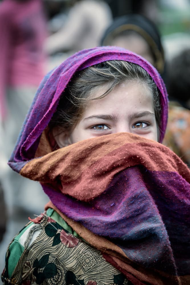 Shy Girl Peeking by Trevor Cole — canvas wall art