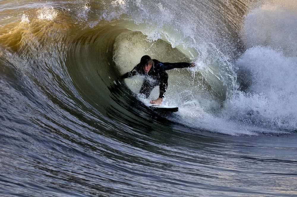 Surfer In The Barrel by Claudio Moretti — canvas wall art