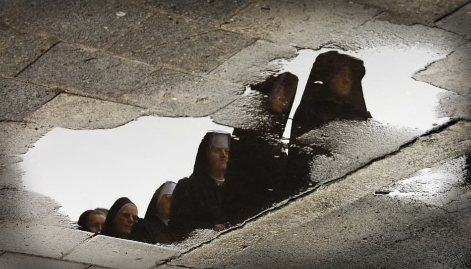 Nuns Reflected in Puddle by Jacek Stefan — canvas wall art