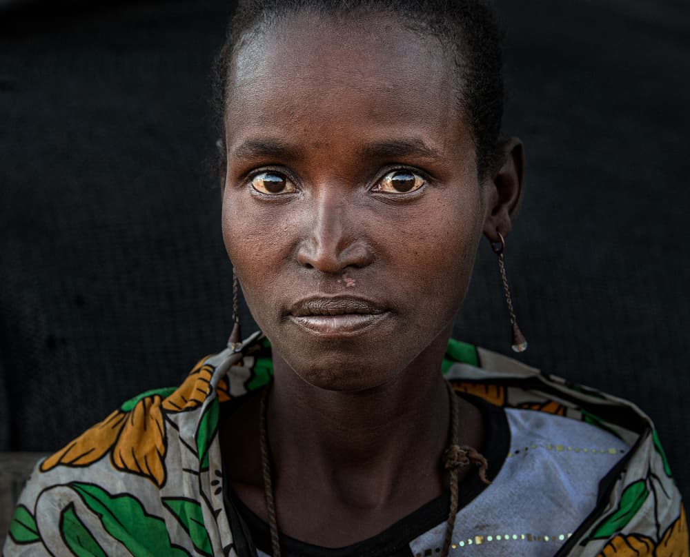 African Woman's Gaze by Joxe Inazio Kuesta Garmendia — canvas wall art