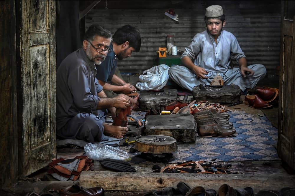Traditional Shoemakers Workshop by Irene Perovich — canvas wall art
