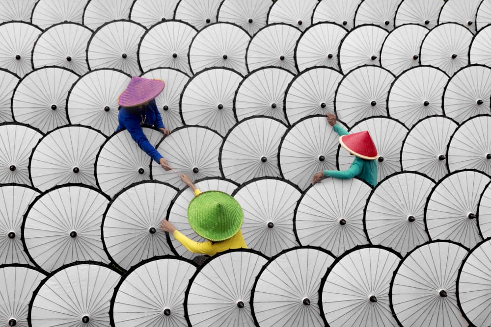 Colorful Hats White Umbrellas by Gatot Herliyanto — canvas wall art