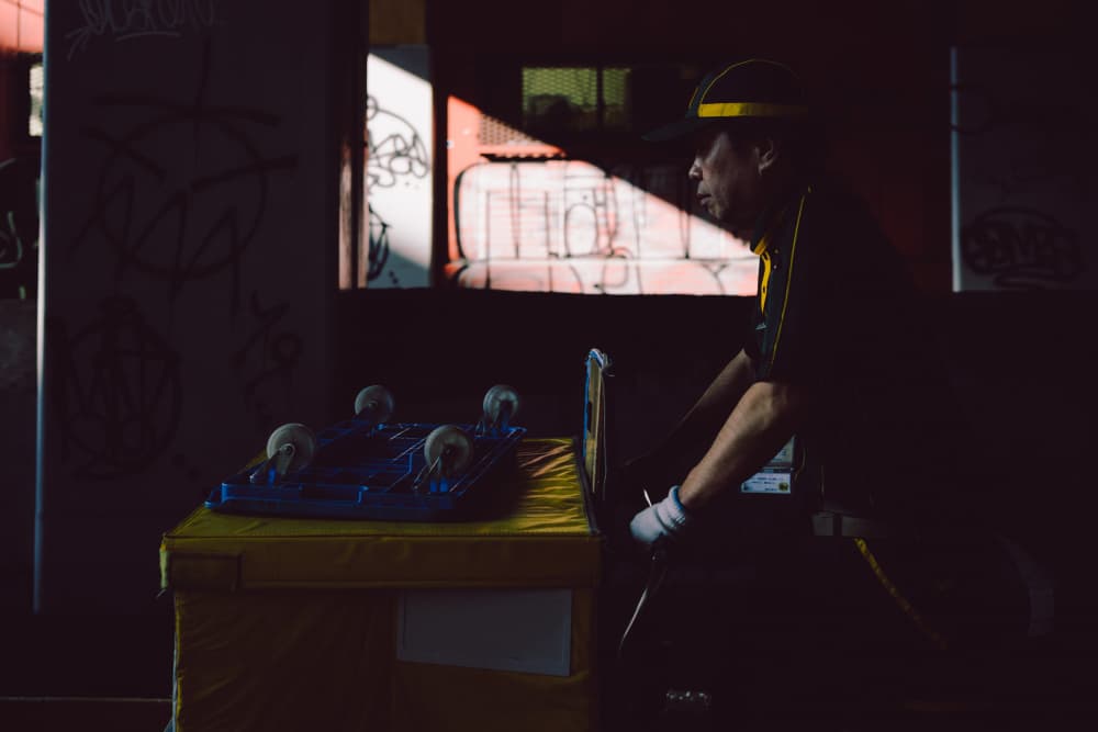 Worker in Dramatic Light by HIDASAN — canvas wall art