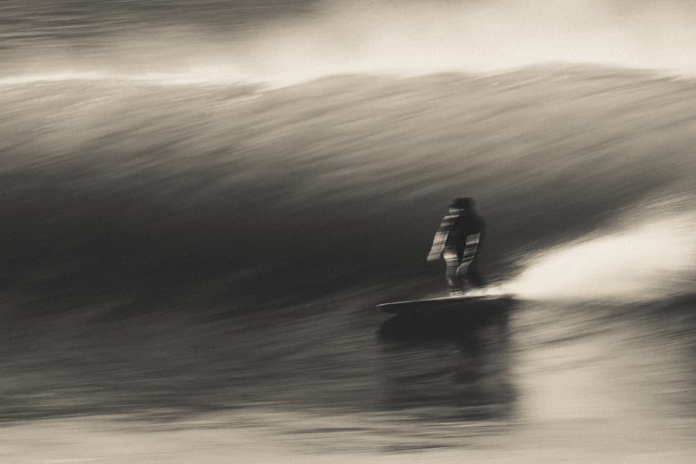 Surfer Rides Powerful Wave by Shawn Orbe — canvas wall art