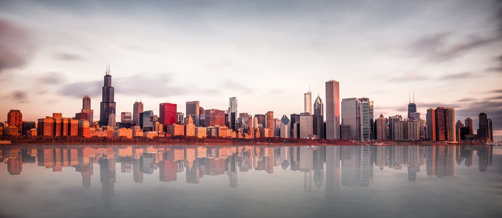 Serene City Skyline Reflection by Marcin Kopczynski — canvas wall art