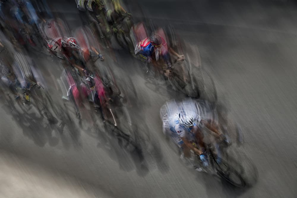 Peloton in Motion by Milan Malovrh — canvas wall art