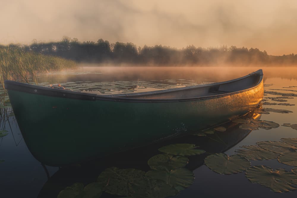 Sunrise Canoe Reflection by Dariusz Budyta — canvas wall art