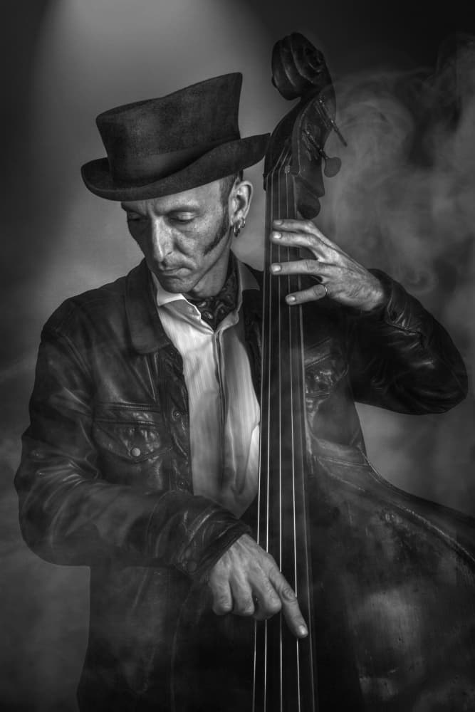 Moody Bass Player by David Leyland — canvas wall art