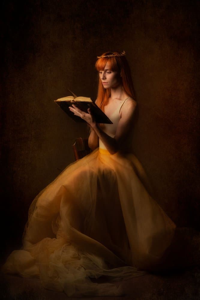 Pensive Woman Reading by Amnon Eichelberg — canvas wall art
