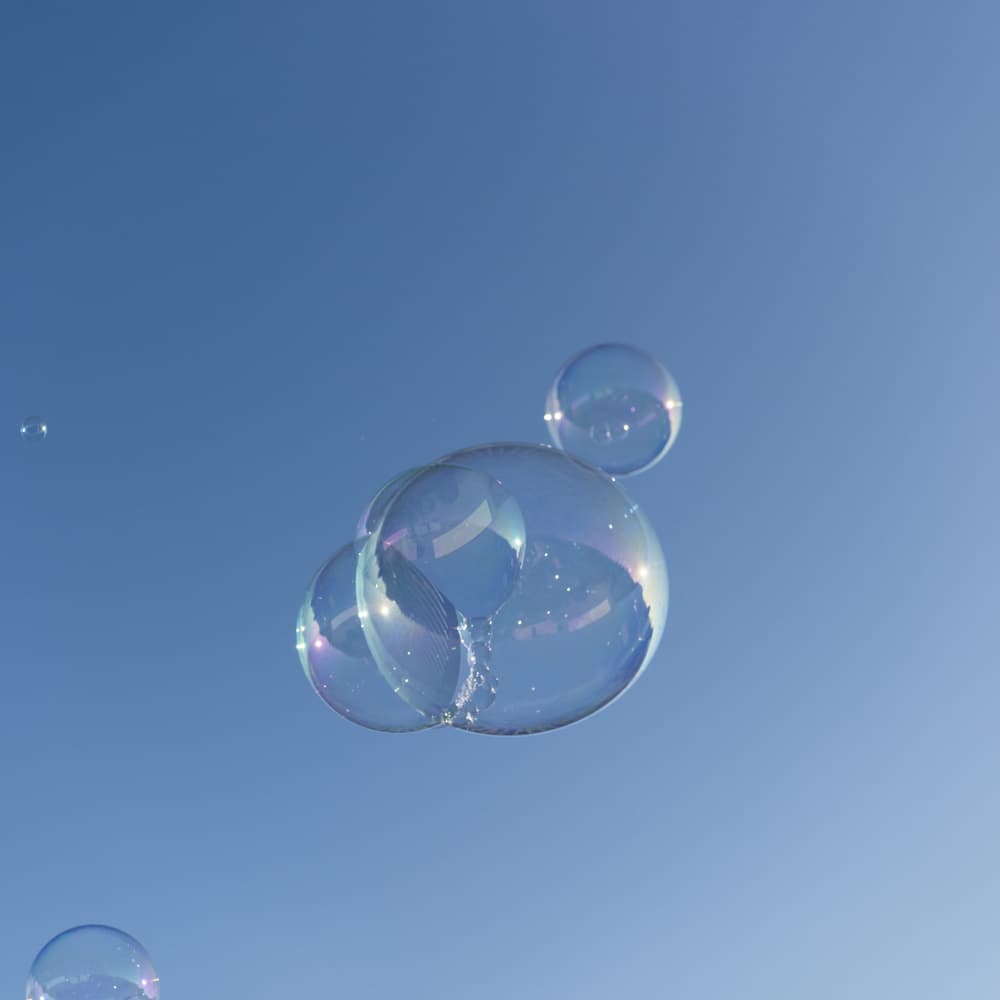 Floating Blue Bubbles by Lynann Colligan — canvas wall art