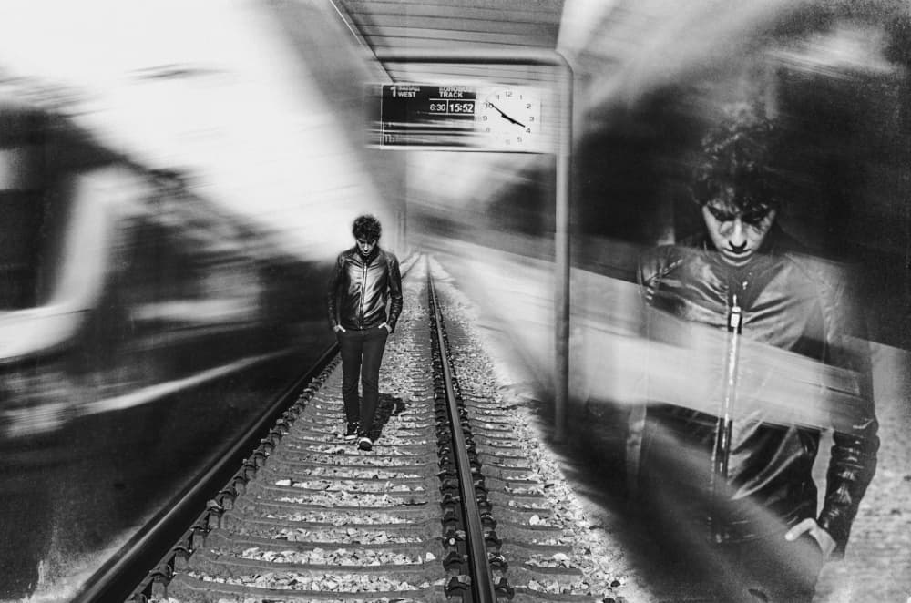 Pensive Man Train Station by Desislava Ignatova — canvas wall art