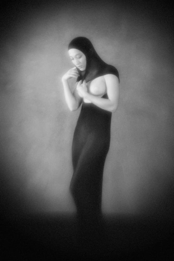 Pensive Hooded Woman by Mel Brackstone — canvas wall art