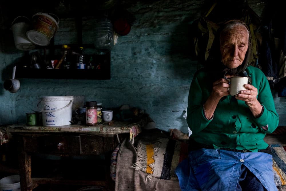 Elderly Woman Quiet Moment by Andrei Nicolas - The Traveler — canvas wall art