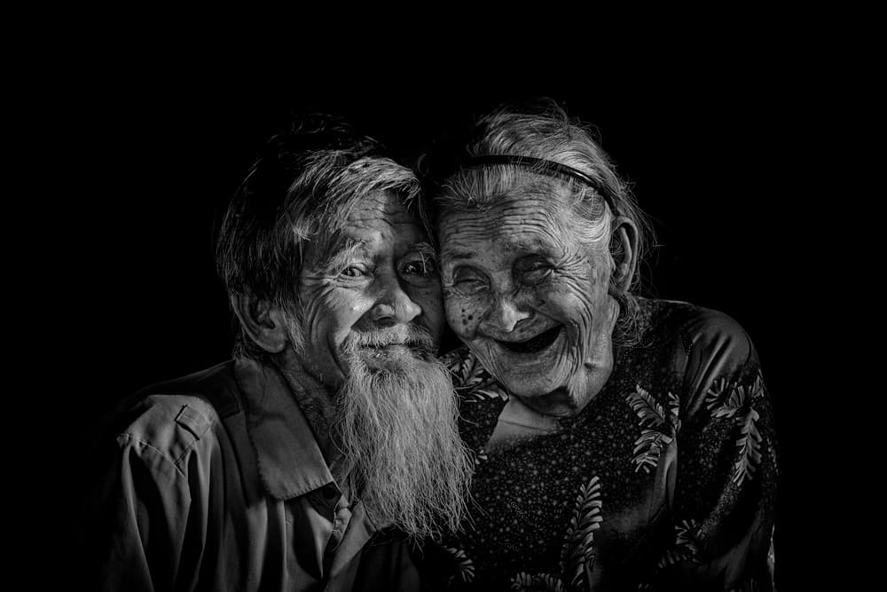 Joyful Elderly Couple by Veli Aydogdu — canvas wall art