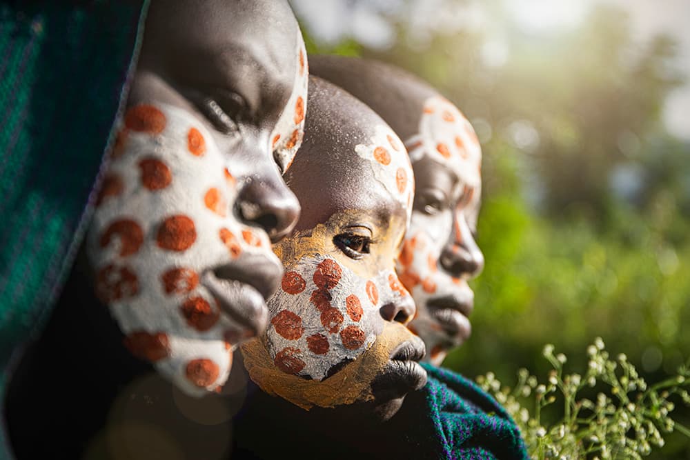 African Painted Faces by Svetlin Yosifov — canvas wall art