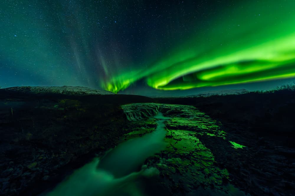 Aurora River Glow by Stefan Schilbe — canvas wall art
