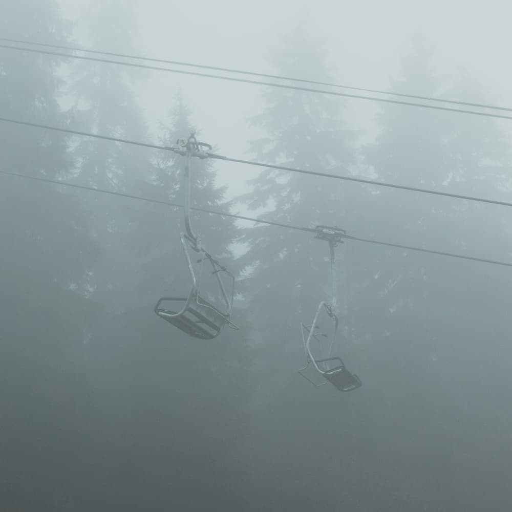 Foggy Ski Lifts by Lynann Colligan — canvas wall art