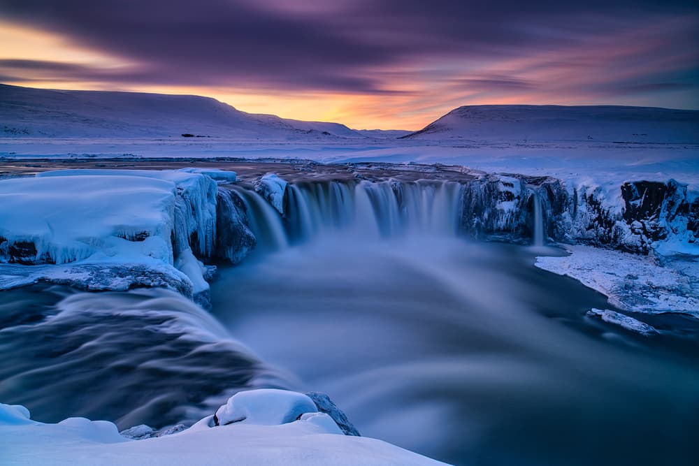 Frozen Iceland Waterfall by Luigi Ruoppolo — canvas wall art