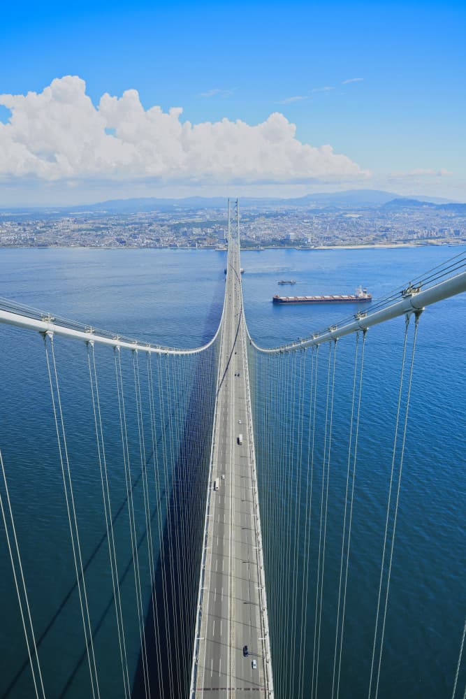 Long Coastal Bridge View by Hitoshi Yamada — canvas wall art