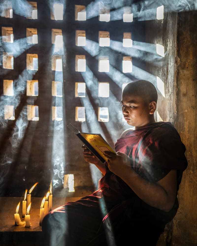 Monk Reading Sunbeams by Mahendra Bakle — canvas wall art