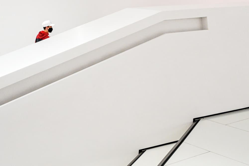 Man On White Minimalist Stairs by Linda Wride — canvas wall art
