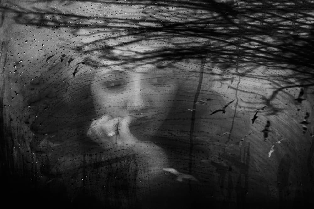 Pensive Woman Rainy Window by Ummu Nisan Kandilcioglu — canvas wall art