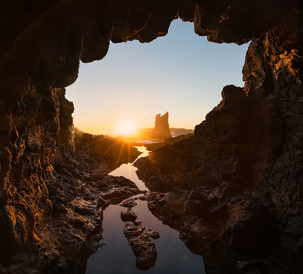 Sunset Through Sea Cave by Jingshu Zhu — canvas wall art