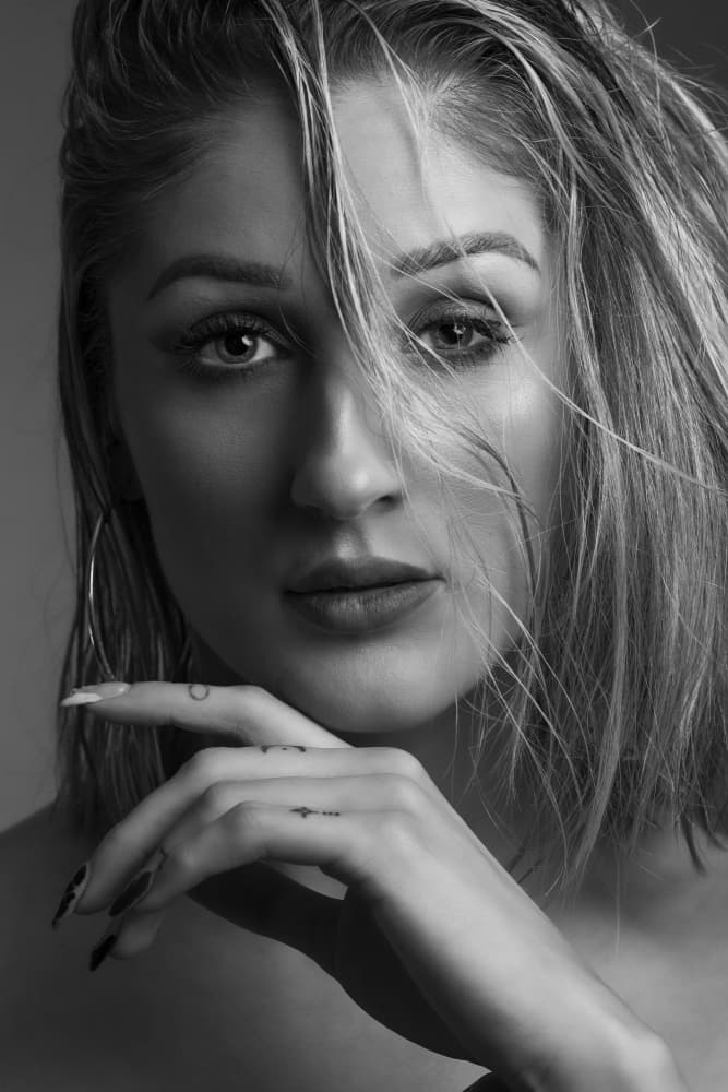 Confident Blonde Gaze by Hardik Pandya — canvas wall art
