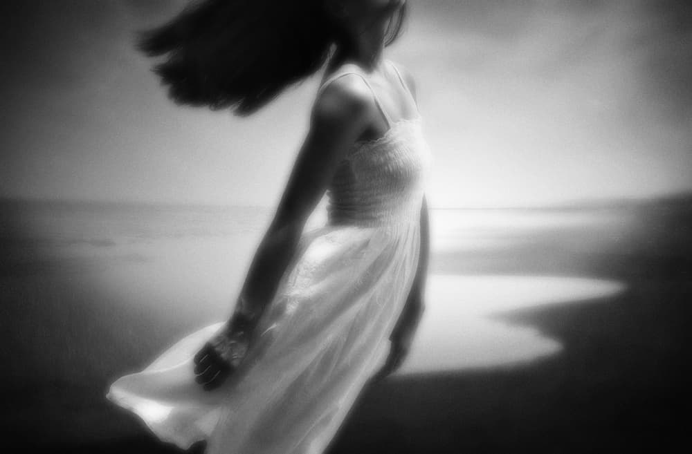 Dreamy Beach Woman by Hari Sulistiawan — canvas wall art