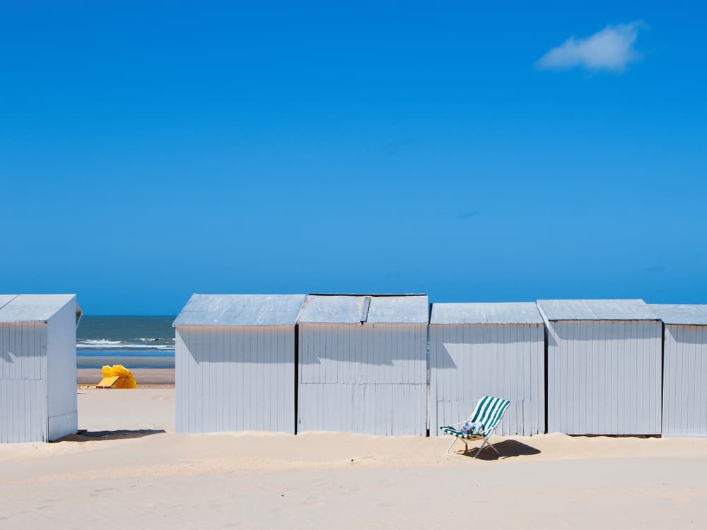 Serene Beach Huts by Massimo Della Latta — canvas wall art