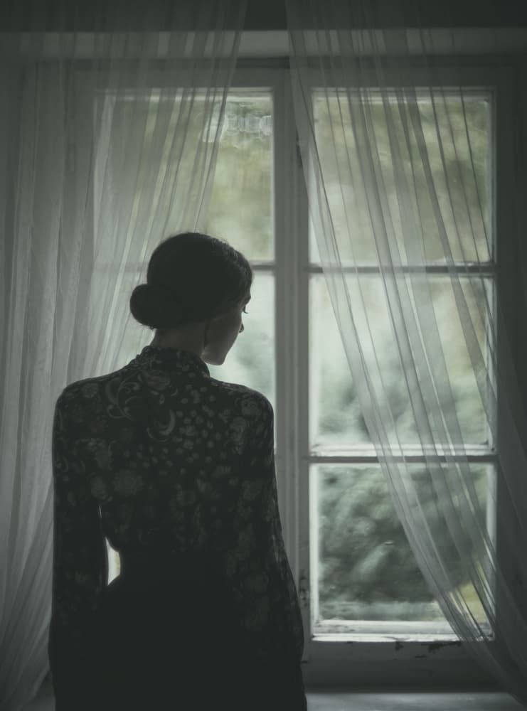 Pensive Woman by Window by Magdalena Russocka — canvas wall art