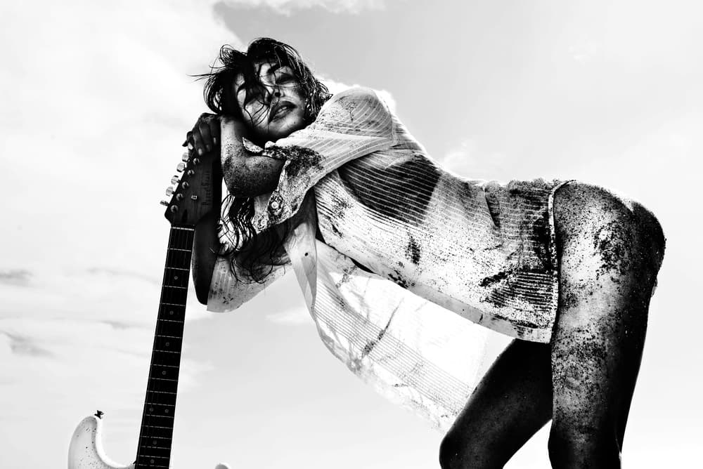 Sensual Guitar Woman by Eddie Wetton — canvas wall art