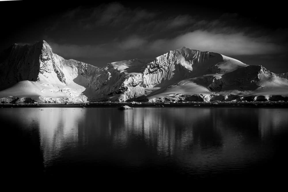 Dramatic Mountain Reflections by Andreas Woernle — canvas wall art