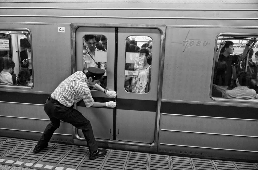 Japanese Train Push by Joxe Inazio Kuesta Garmendia — canvas wall art