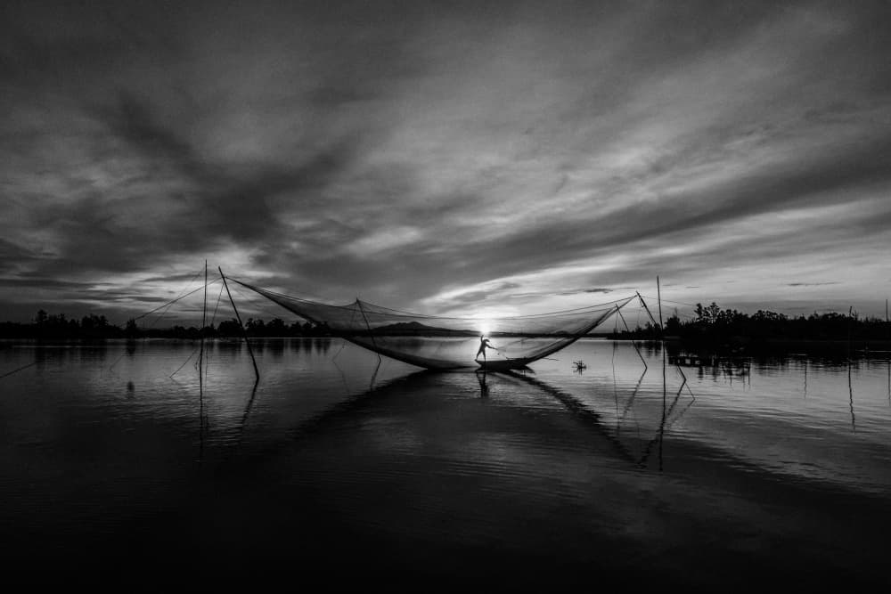 Sunset Fisherman Reflection by ADIREK M — canvas wall art