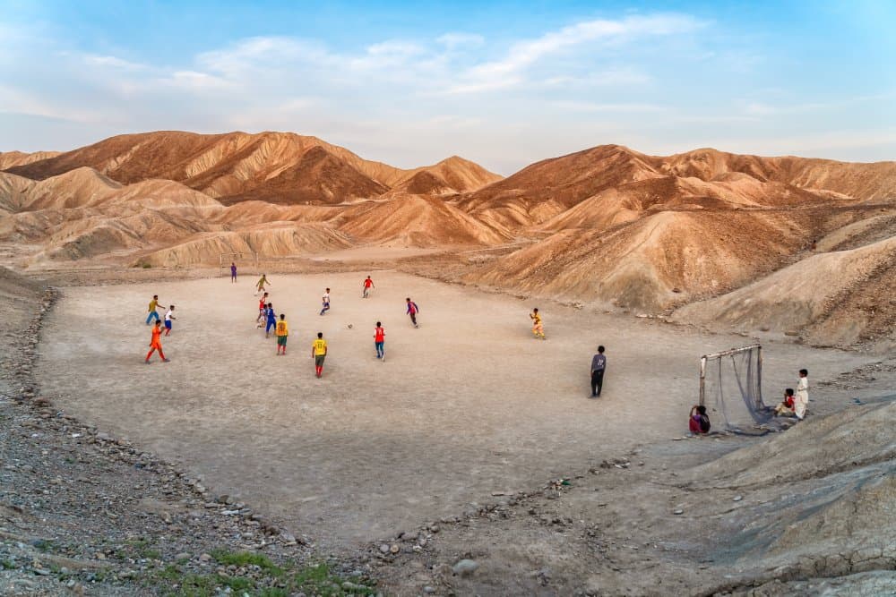 Children's Desert Soccer by Hamid Jamshidian — canvas wall art