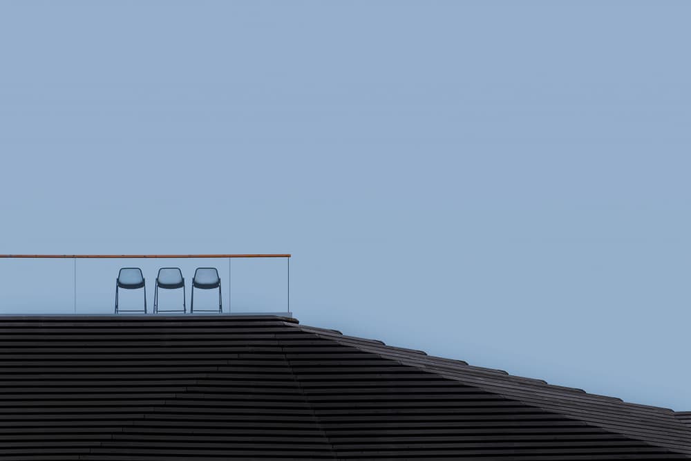 Three Minimalist Rooftop Chairs by Rolf Endermann — canvas wall art