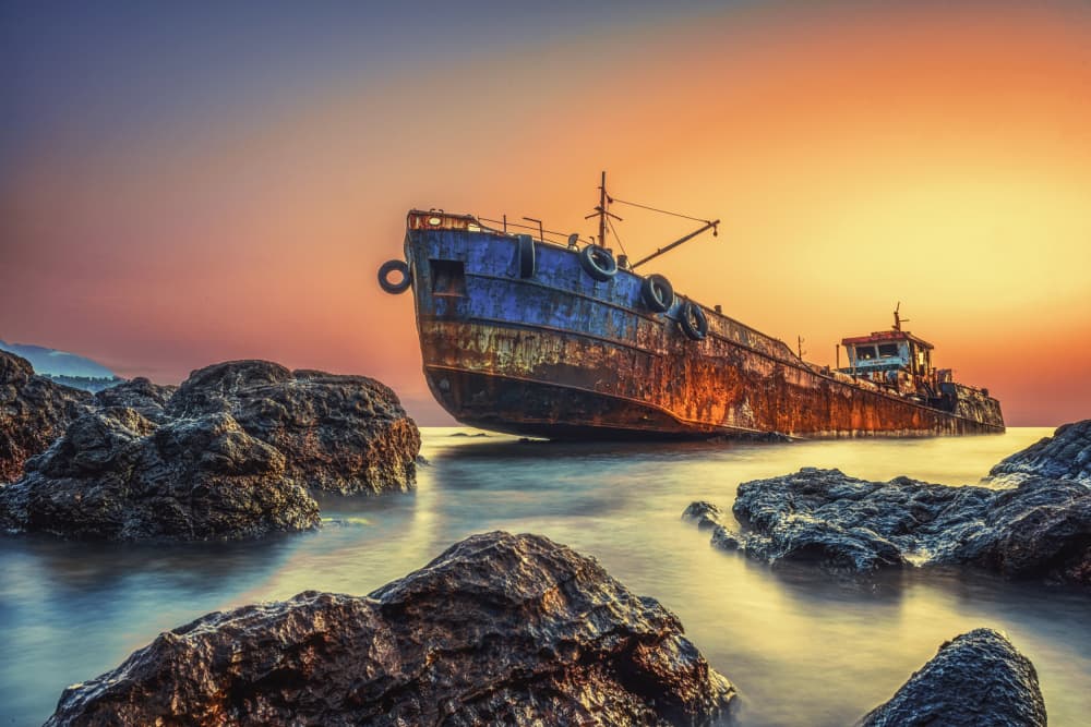 Rusty Shipwreck Sunset by wail.Hamdane — canvas wall art