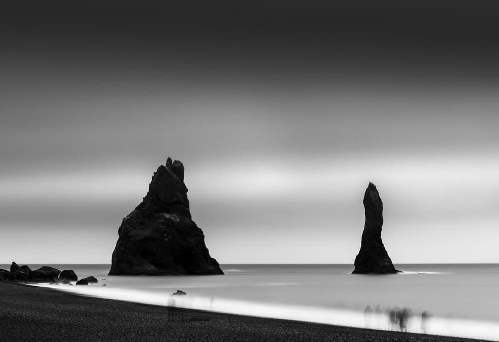 Black Sand Sea Stacks by George Digalakis — canvas wall art