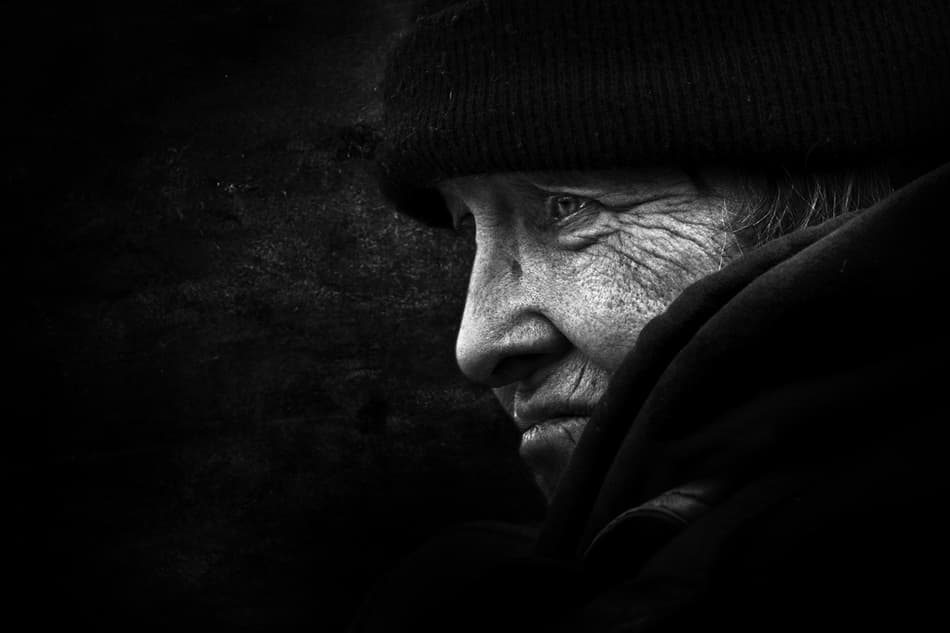 Pensive Elderly Woman by Mohammed Baqer — canvas wall art