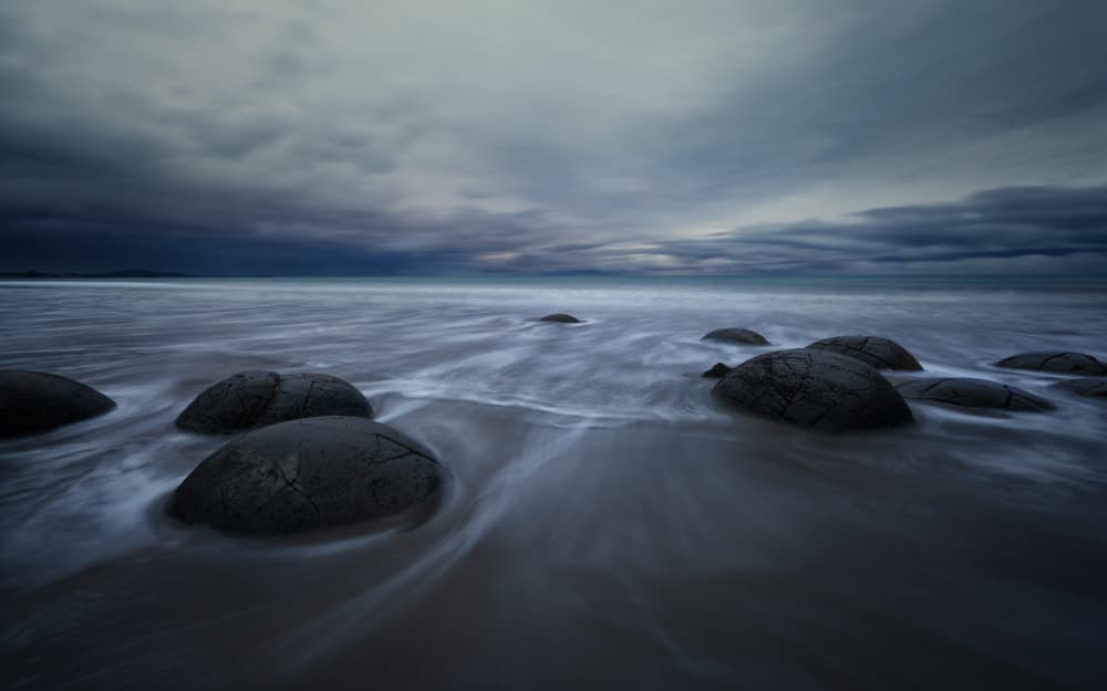 Moody Ocean Boulders by YANGYING — canvas wall art