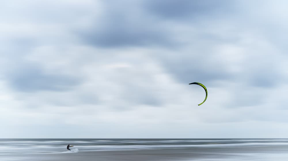Kitesurfer's Coastal Calm by Christiane Heggemann — canvas wall art