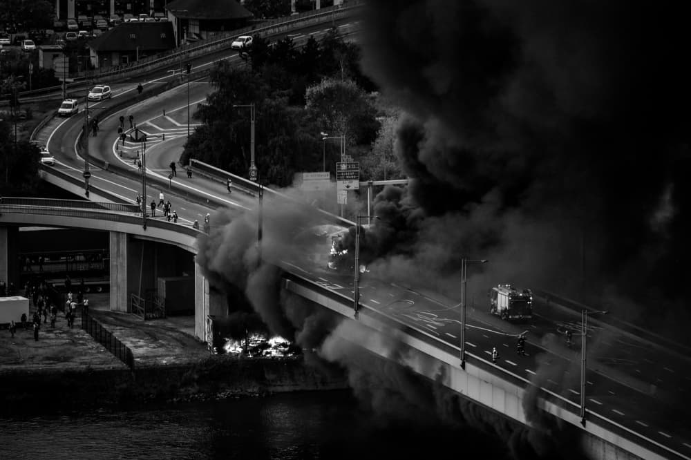 Burning Bridge Protest by Alexandre Valin — canvas wall art