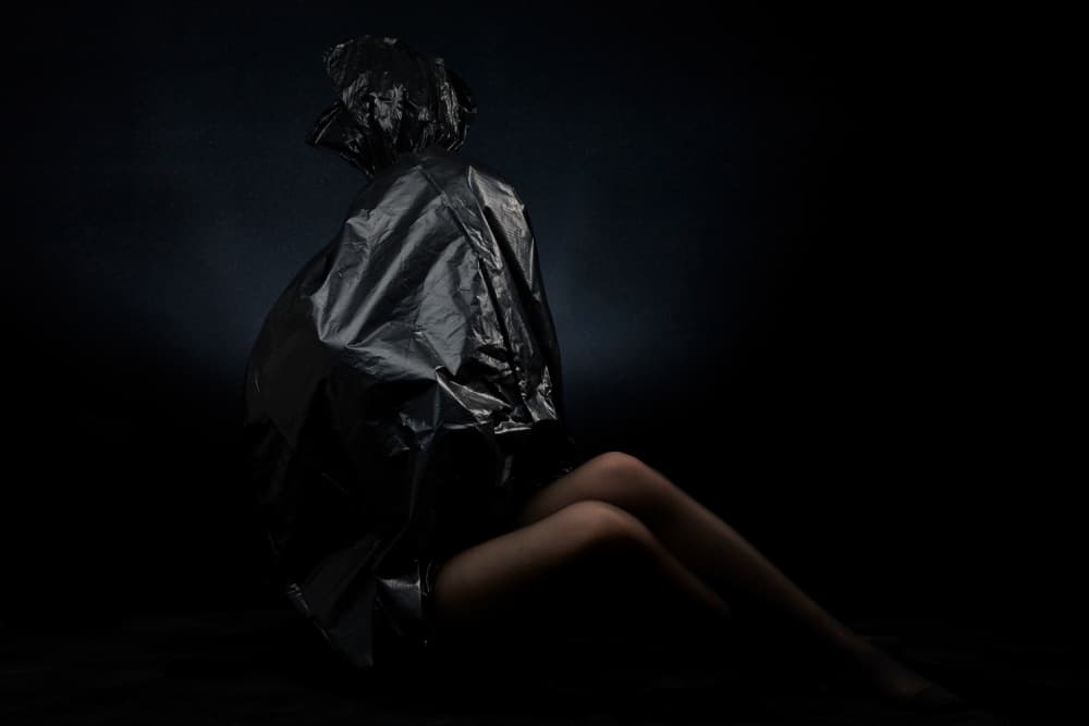 Mysterious Figure Black Bag by Hooman Sedaghi — canvas wall art