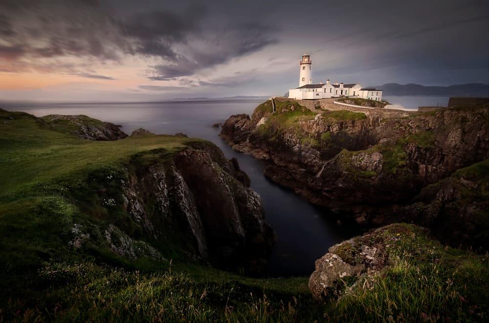 Irish Coastal Lighthouse by Yolanda Romero Angueira — canvas wall art