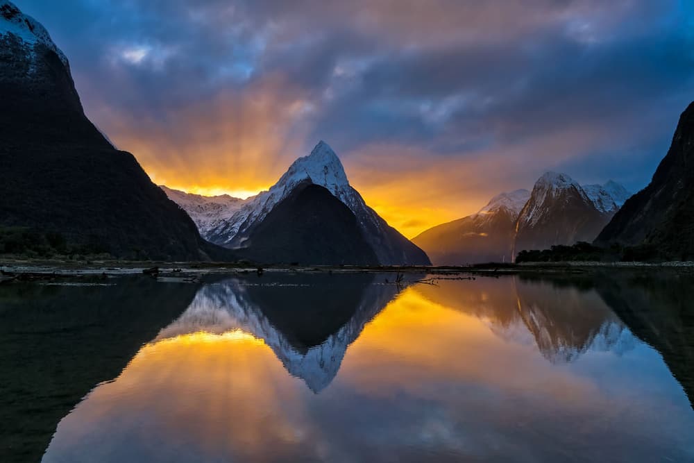 Dramatic Mountain Sunrise Reflection by Hua Zhu — canvas wall art